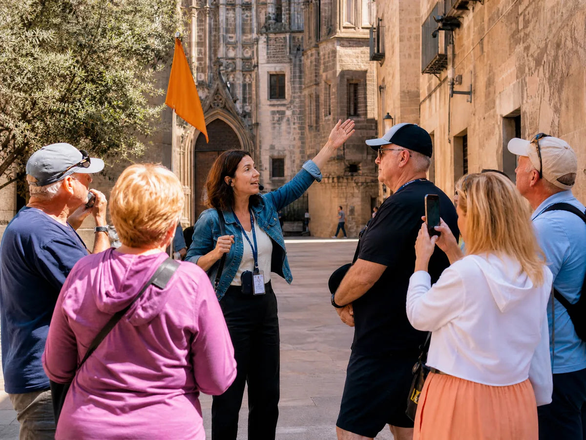 English-speaking guide leading a small group tour in Barcelona Gothic Quarter