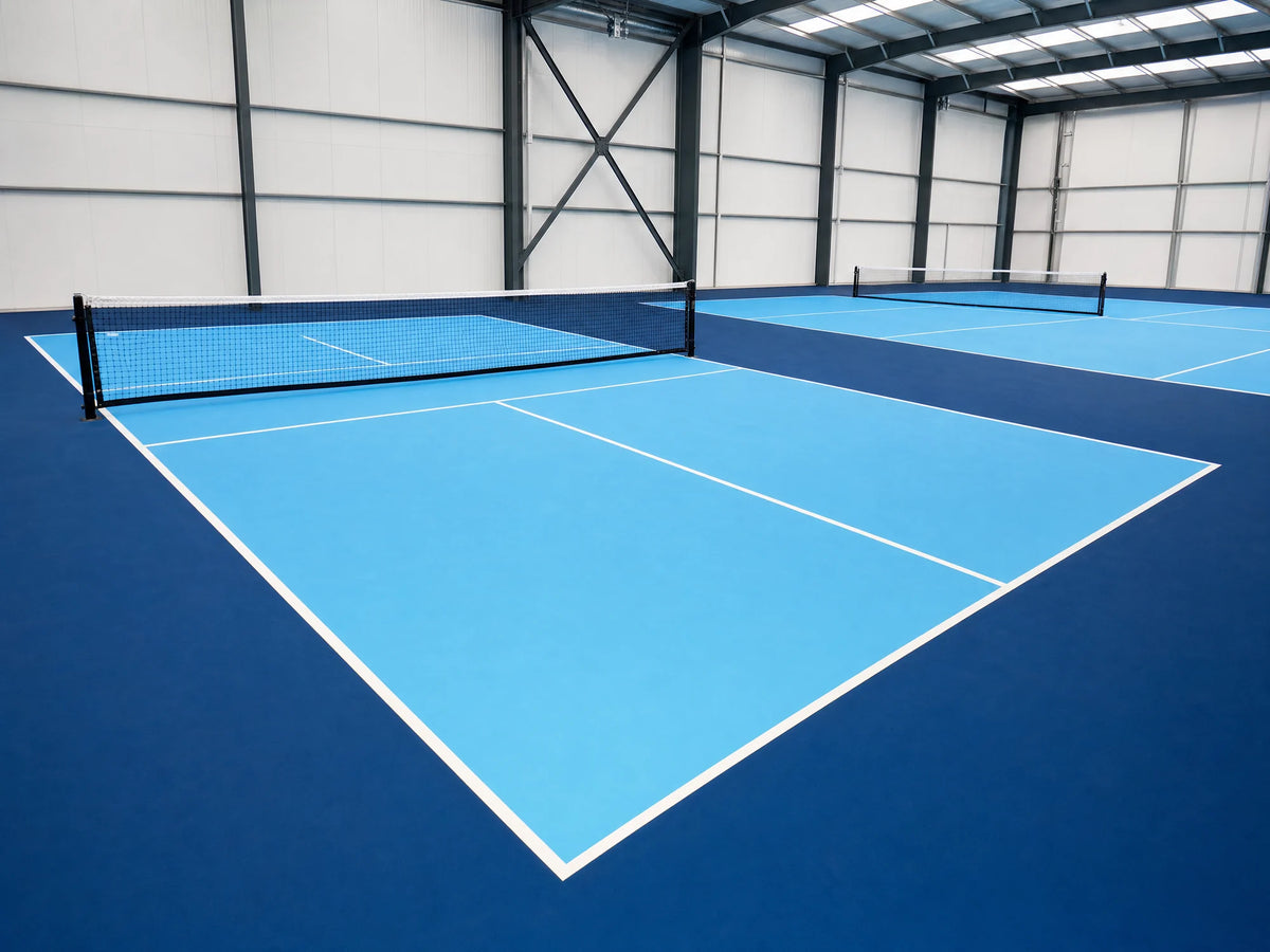 Pista de pickleball portátil con combinación de colores celeste y azul